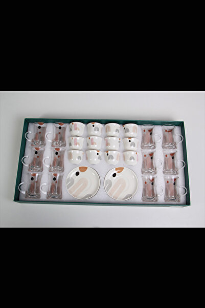 Generic A luxurious hospitality set – coffee cups and tea glasses with elegan...