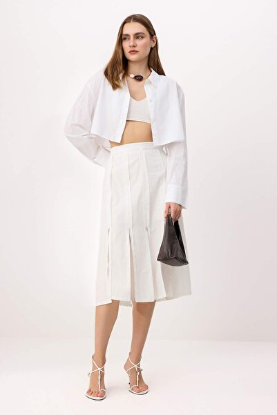 Trendyol Collection تنورة ميدي منسوجة باللون الأبيض TWOSS26ET00113