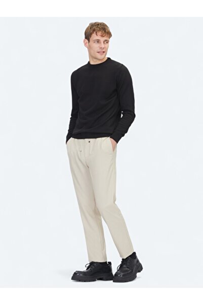 Kip بنطلون كاجوال منسوج بلون بيج داكن