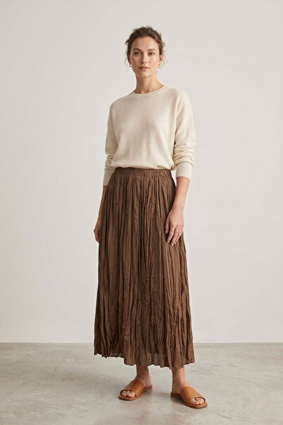 Şiir تنورة طويلة من فادوز بخصر مطاطي وتفاصيل مميزة وتصميم مقطع ومقسّم - توبراك