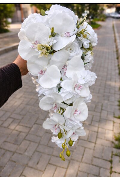 Botanikelbuketleri Akışlı orkideli gelin çiçeği ve damat yaka ile birlikte