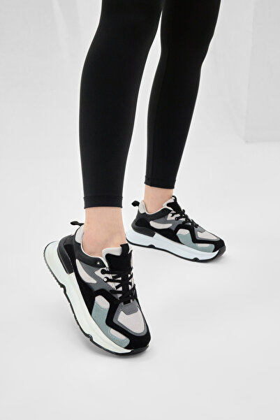 Tonny Black Γυναικείο άνετο sneaker σε μαύρο και γκρι χρώμα με σόλα Eva
