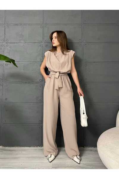 LE CARAMBOLE Salopetă de damă bej cu șolduri căptușite și curea