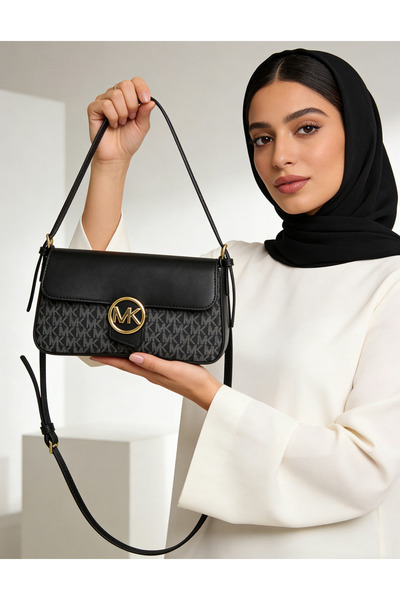 MKE Black monogrammed leather shoulder/crossbody bag