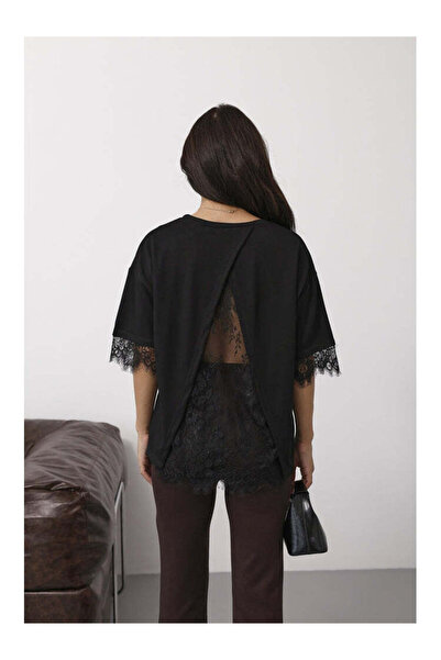 Perry Boutique Black Short Sleeve Blouse with Lace Detail on the Back and Sle...