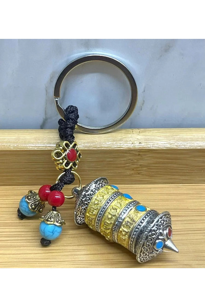 TeknoKapsül سلسلة مفاتيح معدنية على شكل عجلة الحظ التبتية Alk4462