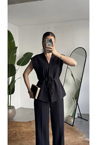 asfamoda Γυναικείο μαύρο γιλέκο με κουμπιά και δέσιμο, παντελόνι παλάτσο με π...