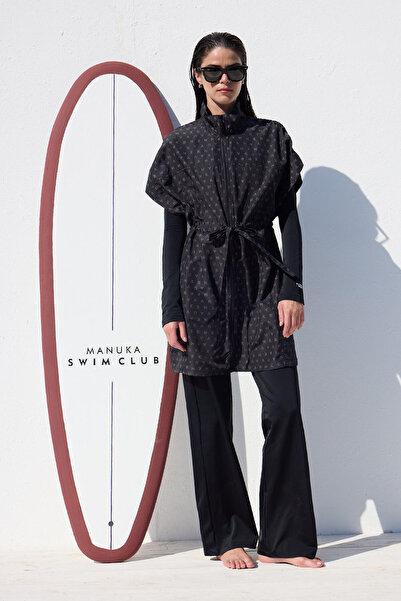 Manuka Badeweste-Logo – stilvolles und bequemes Design