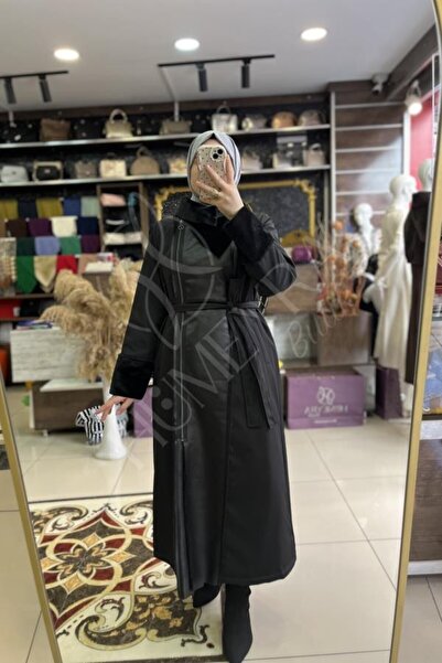 HUMEYRA ياقة من الفرو مع أكمام من الجلد. معطف