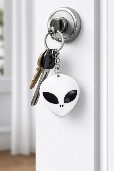 HER ŞEY NOTA www.herseynota.com Μεταλλικό μπρελόκ Unisex με λευκή φιγούρα εξω...