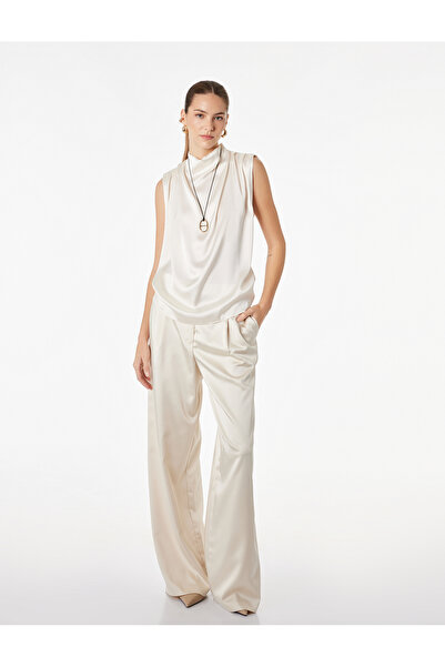 Koton Σατέν μπλούζα με ψηλό γιακά, αμάνικη και με λεπτομέρεια ντραπέ