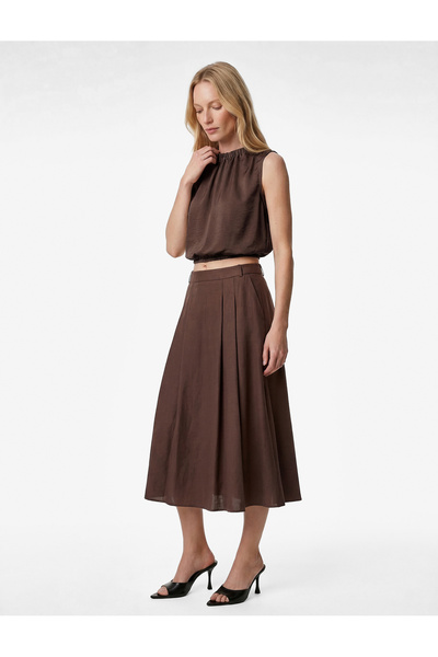 Koton Άνετη εφαρμογή, υφασμάτινη φούστα με τσέπες, πλισέ, μίντι, με φαρδιά γρ...