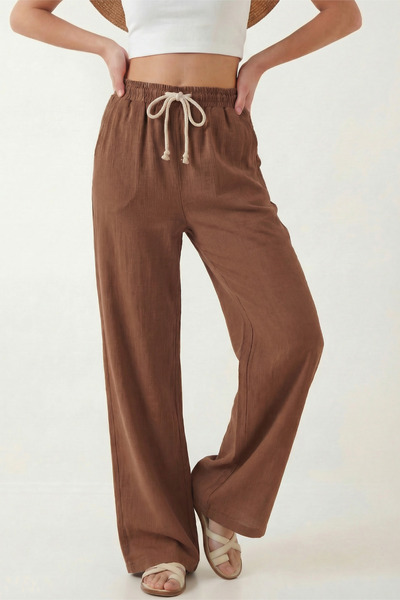 Veleno Γυναικείο παντελόνι Palazzo Μουσελίνα Μπεζ με φαρδιά μπατζάκια και ψηλ...