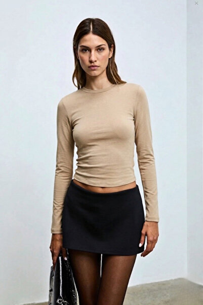 GUARAZ Γυναικείο ελαστικό υφασμάτινο μπλουζάκι σε μπεζ χρώμα, με μακριά μανίκ...