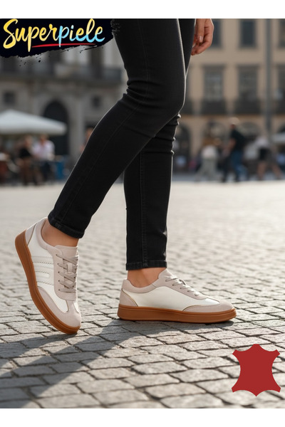 ANGEL BLUE Fashionable sports shoes are made of natural leather combined with...