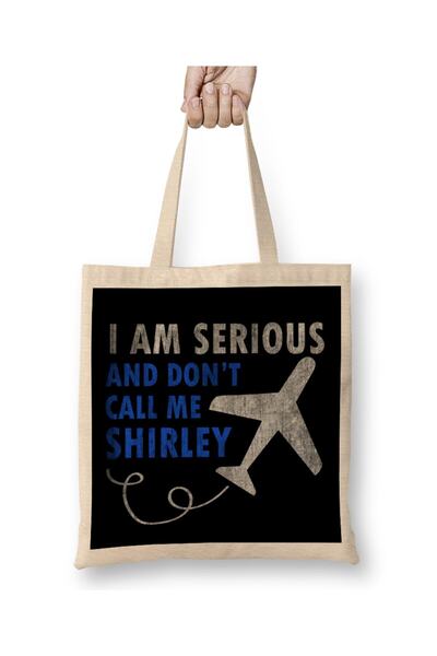dekado حقيبة قماش طائرة من ماركة "I Am Serious And Don't Call Me Shirley" بمق...