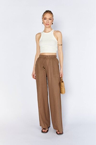 CGA Γυναικείο λινό παντελόνι Καφέ λινό παντελόνι με λεπτομέρεια ραφής και τετ...