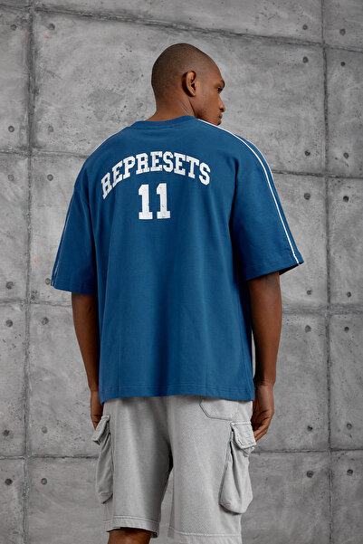 NOMARC Tricou oversize albastru cu imprimeu OVERCOMEE