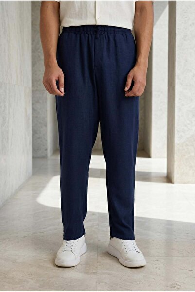 Valiberta بنطلون رياضي رجالي من قماش أوديسا بقصة فضفاضة من Prawer - أزرق داكن