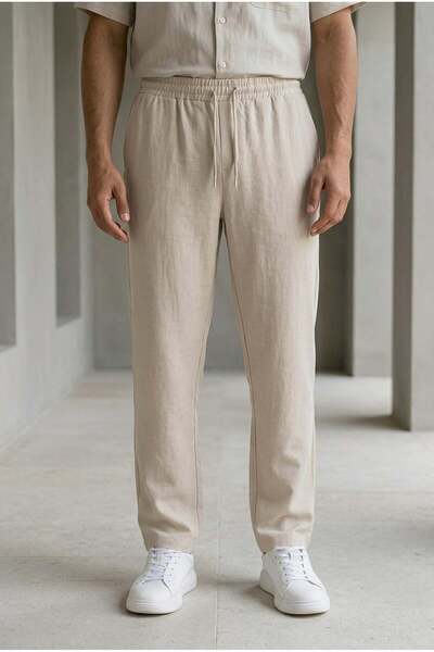 Valiberta بنطلون رجالي من قماش أوديسا بقصة فضفاضة من Prawer - بيج