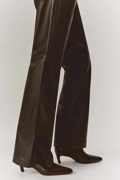 H&M Coated bootcut trousers