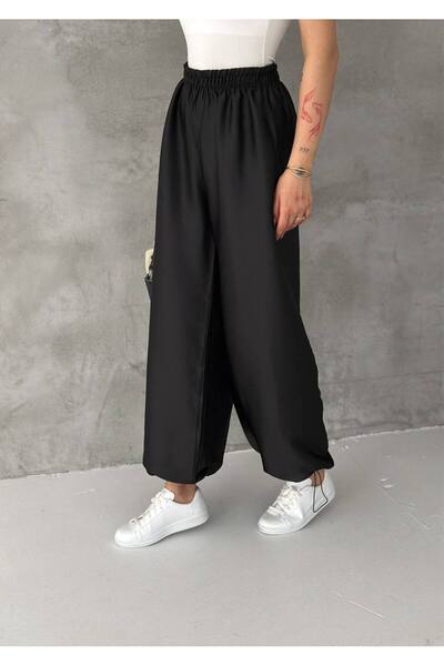 Noa&Noa Γυναικείο παντελόνι από σατέν ύφασμα με λεπτομέρεια στο πόδι και φαρδ...