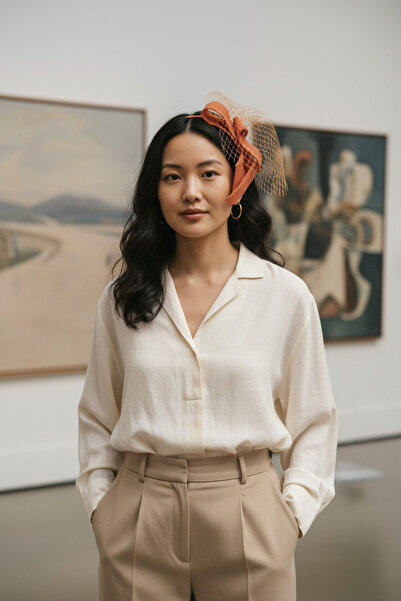 Miss Hat Orange Asymmetrical Sinamay Bow with Veil