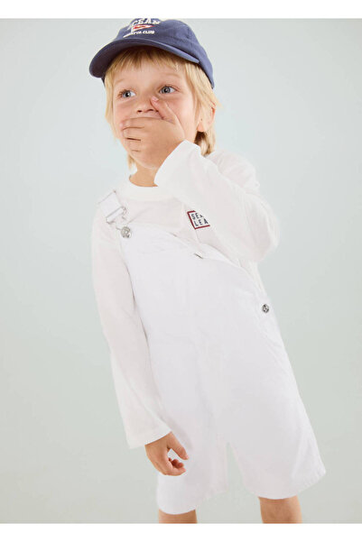 MANGO Baby Cepli denim tulum