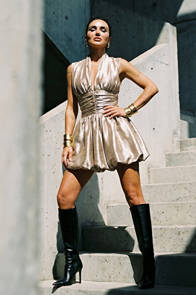 FASHION COCKTAIL Μεταλλικό μεταλλικό λαμέ ύφασμα με τσέπες με φούστα με μπαλό...