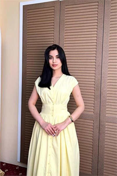 Neşeli Butik Γυναικείο κίτρινο φόρεμα με θηλυκή εφαρμογή, λεπτομέρεια στη μέσ...