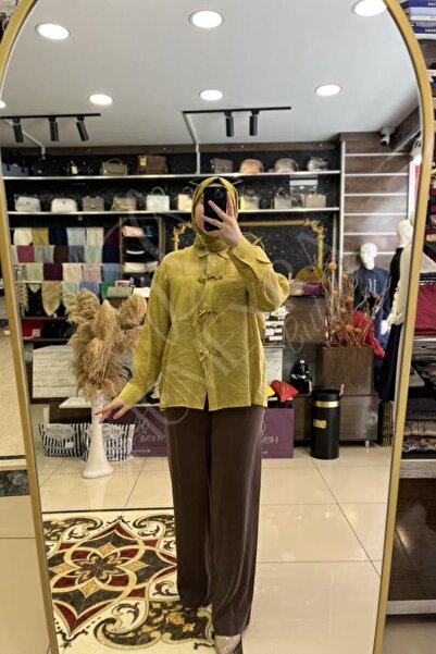 HUMEYRA Belted Palazzo Pants