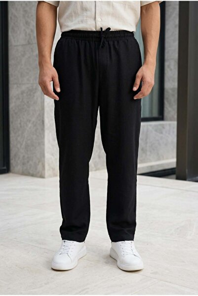 Valiberta بنطلون رياضي رجالي من قماش أوديسا بقصة فضفاضة من Prawer - أسود