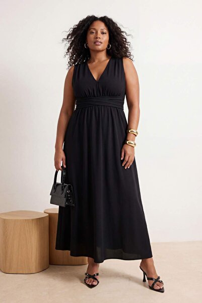 Trendyol Curve Μαύρο λειτουργικό φόρεμα παραλίας με δεσίματα και μακριά υφάσμ...