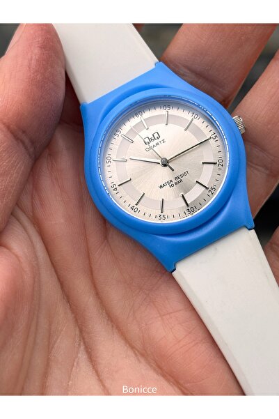 Q&Q ساعة يد زرقاء اللون للفتيات بقوة 10 بار مناسبة للاستخدام في حمام السباحة ...