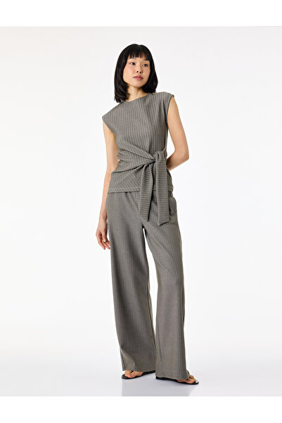 Koton Παντελόνι με κορδόνια στη μέση, τσέπες, ίσια φαρδιά μπατζάκια και ρίγες