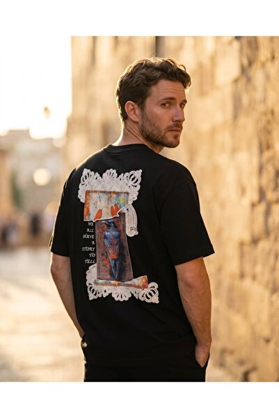 CANMODA Ανδρικό μπλουζάκι σε μαύρο χρώμα, oversize εφαρμογή, με στάμπα κοράκι...