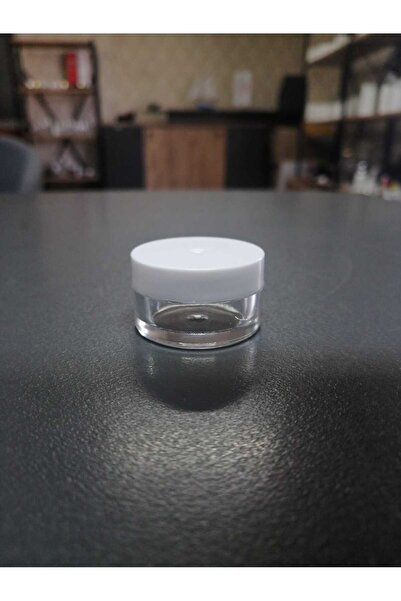 5 ml Şeffaf, sert plastik kavanoz. 5 Adet. Beyaz kapaklı.