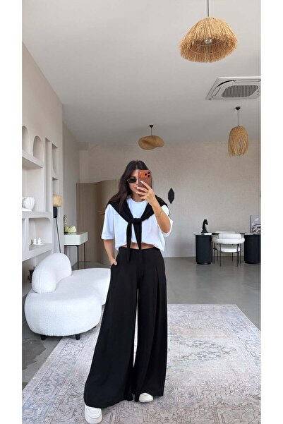 Buket Teke Μαύρο υφασμάτινο παντελόνι Oys με πιέτες μπροστά, σε χαλαρή γραμμή