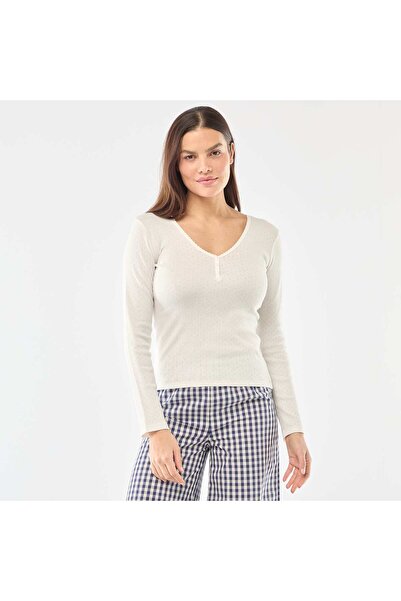 KIABI قميص نوم محبوك بنمط بوينتيل باللون الأبيض