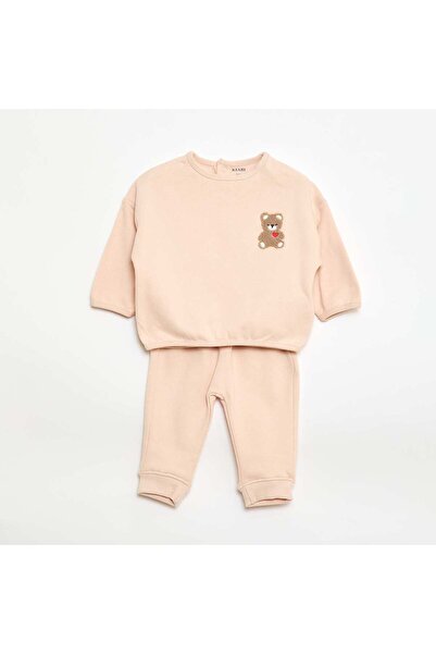 KIABI طقم سويت شيرت وبنطلون رياضي منقوش باللون الوردي