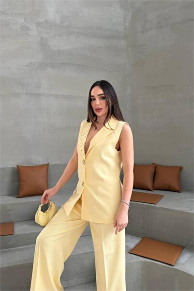Neşeli Butik Γυναικείο κίτρινο παντελόνι με χρυσά κουμπιά και λεπτομέρειες απ...