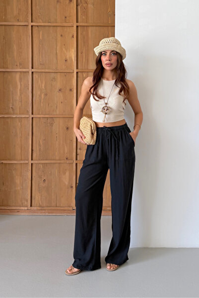 macharel jeans Γυναικείο παντελόνι παλάτσο με φαρδιά μπατζάκια και τσέπες