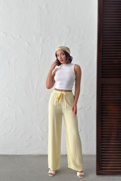 NEW JOURNAL Γυναικείο κίτρινο ελαστικό παντελόνι με ριχτή μέση NJ139