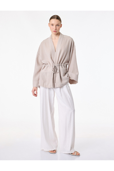 Koton Κιμονό με λινή όψη, φαρδιά μανίκια 3/4, τσέπες και λεπτομέρεια δεσίματο...
