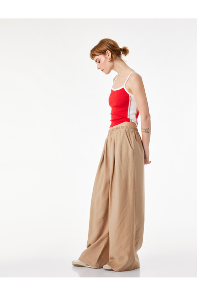 Koton Ελαστική μέση, τσέπες, άνετη εφαρμογή, πλισέ παντελόνι με φαρδιά μπατζάκια