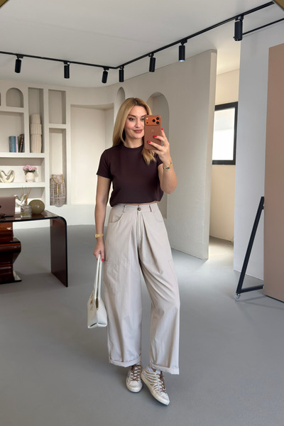 Sezgi Tekin Παντελόνι με λεπτομέρεια τσέπης και πτυχώσεις από πέτρα