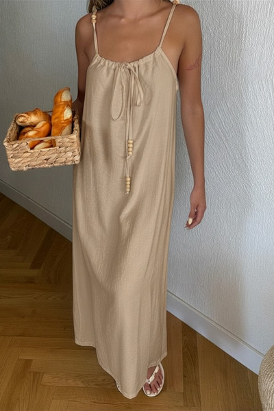 Nana & Mayka Moda Γυναικείο μπεζ φόρεμα με λαιμόκοψη halter, μάξι με κορδόνια...