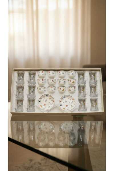 Generic A luxurious hospitality set – coffee cups and tea glasses with elegan...