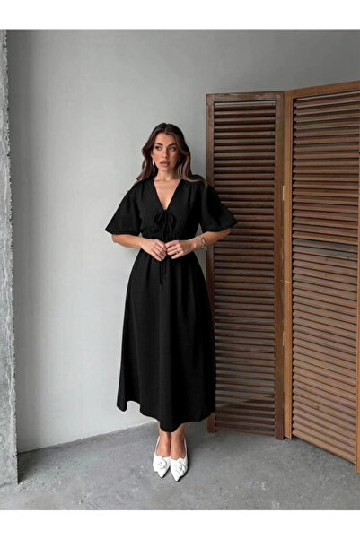 Lusin Γυναικείο κοντομάνικο φόρεμα από μαύρο ύφασμα μουσελίνας με λαιμόκοψη V...