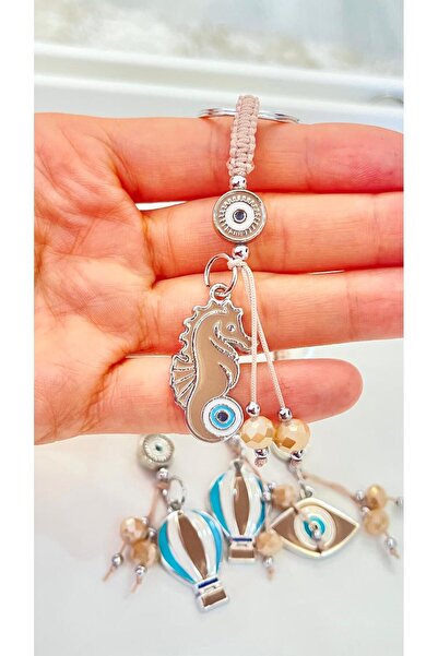 Cassime Μπρελόκ με μοτίβο μπεζ ιπποειδούς θαλάσσιου αλόγου και ασημένιο μάτι ...